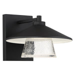 Black outdoor wall light fixture with clear glass shade on a white background