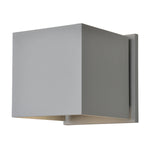 Modern wall-mounted light fixture with a satin square shade on a white background