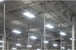 LED Adjustable High bay light installed near the roof of a factory.