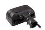 Black plastic mounting bracket with metallic screws and circular panel on top of led flood light with integrated photocell