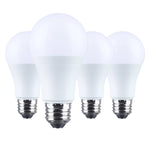 Four white light bulbs with silver bases on a white background