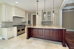 Modern kitchen with wooden island and stainless steel appliances
