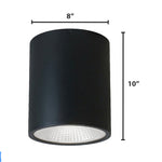 Black architectural cylinder light fixture with matte finish and led panel for ceiling installation