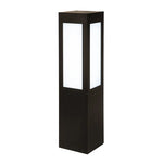 Black rectangular square bollard long lens outdoor lantern with frosted glass panels emitting soft white glow