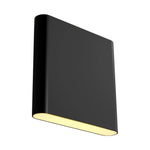 A modern black rectangular wall sconce with a warm yellow light glowing from the underside, shown against a solid white background.