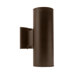 Bronze cylindrical wall light fixture on a white background