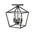 Millennium Lighting four light semi flush mount ceiling light in matte black with exposed filament bulbs for overhead lighting