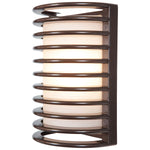 Decorative bronze wall sconce with spiral design on a white background