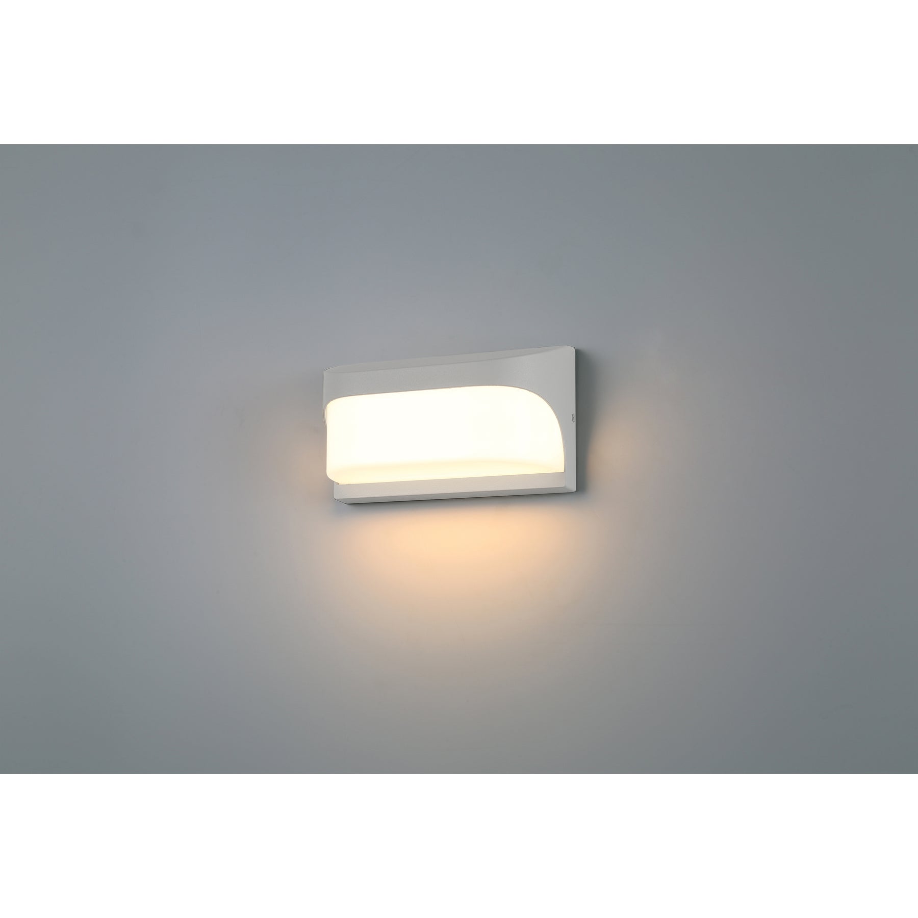 Modern wall-mounted light fixture on a gray background