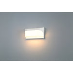 Modern wall light fixture on a gray background