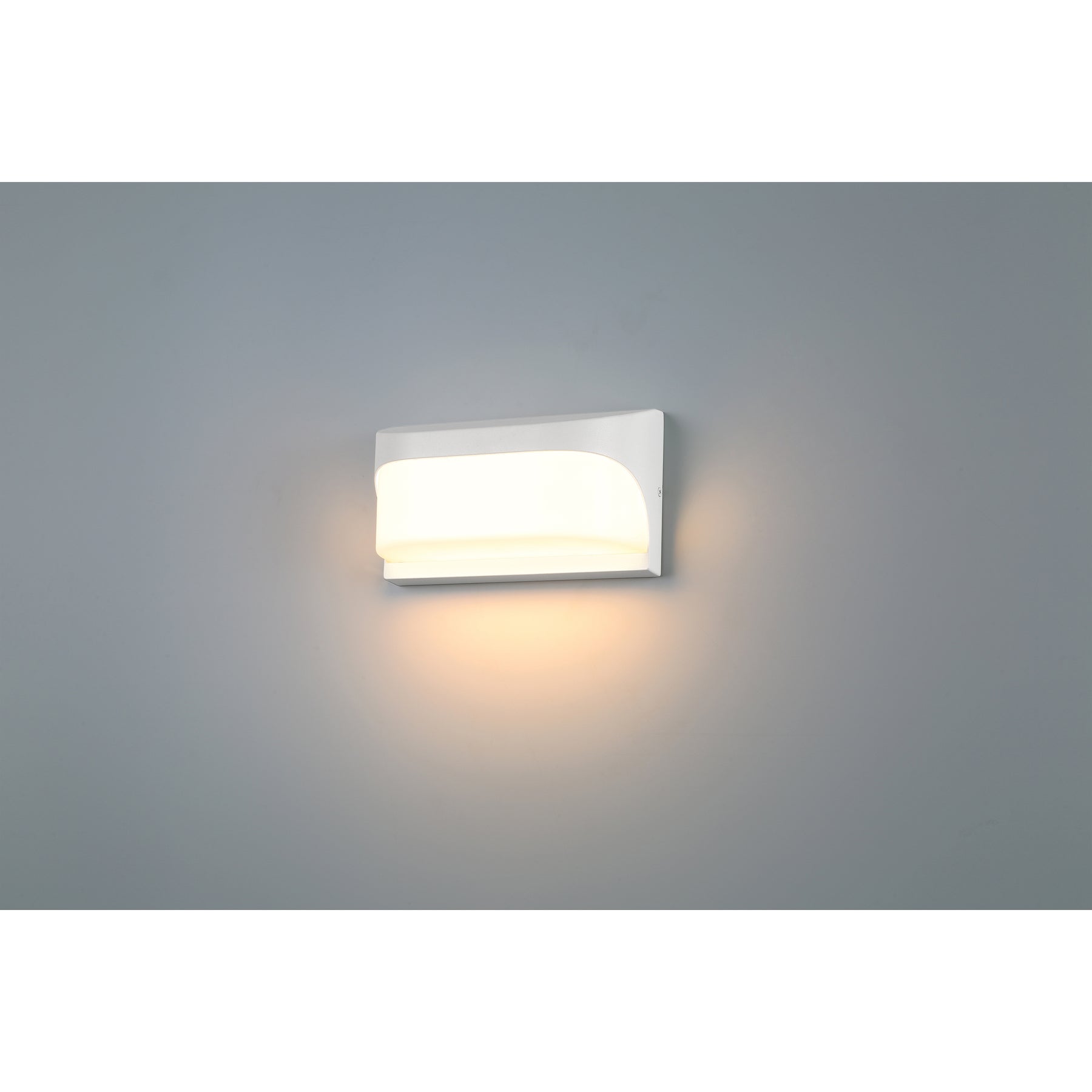 Modern wall light fixture on a gray background