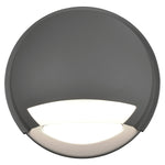Round outdoor wall light fixture on a white background