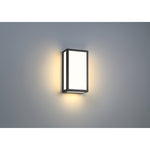 Modern outdoor wall light fixture on a gray background