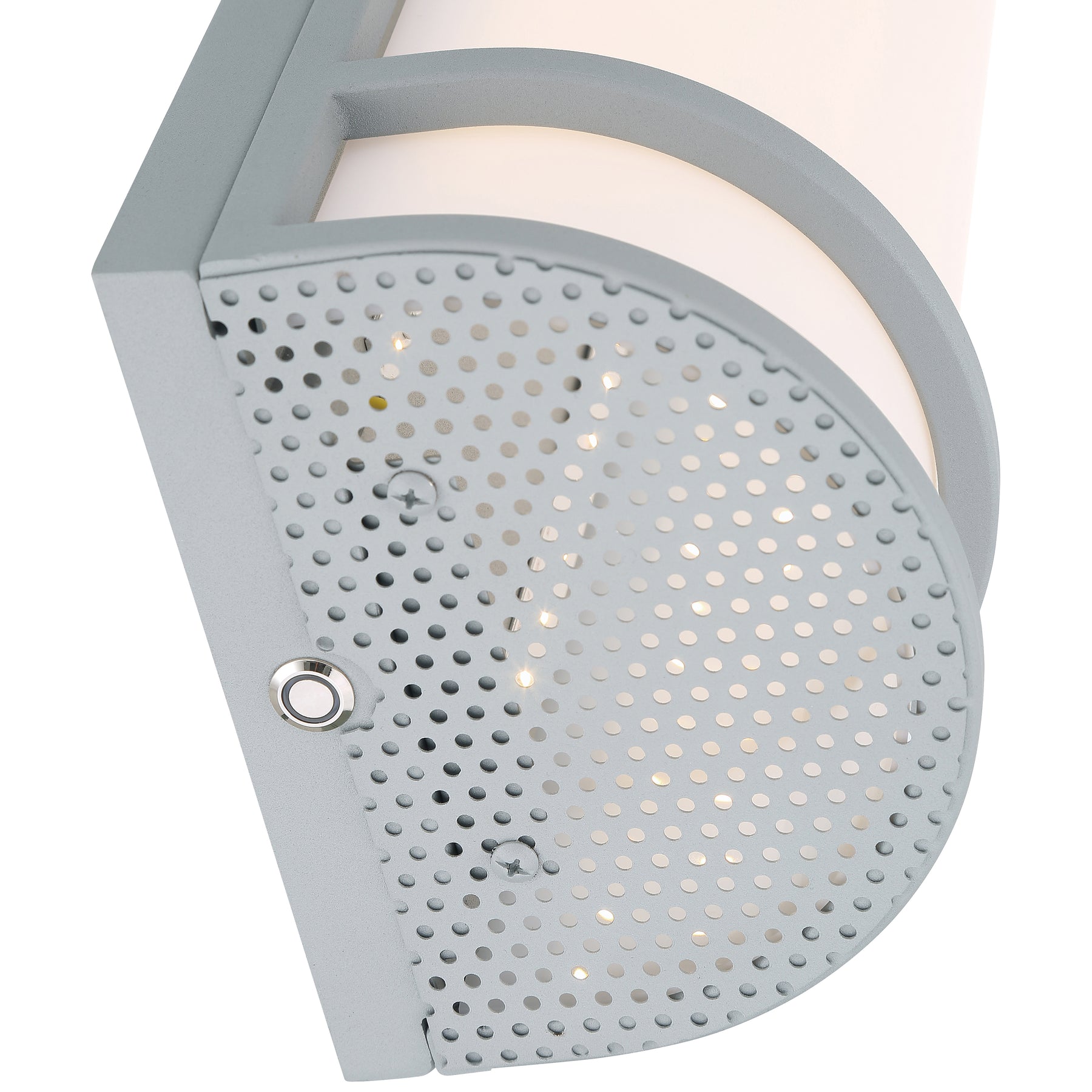 Close-up of a satin wall light fixture with a perforated design on a white background