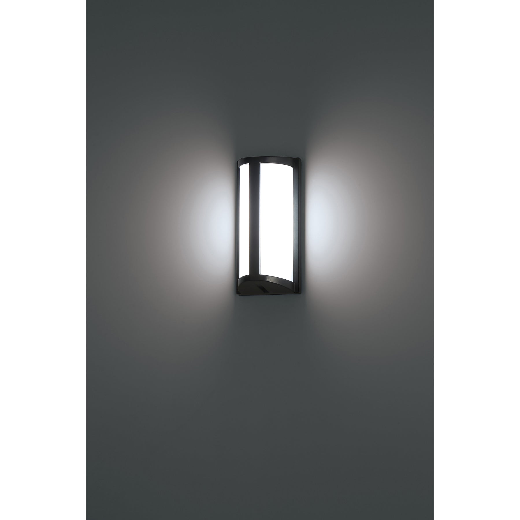 Wall-mounted outdoor light fixture on a gray wall