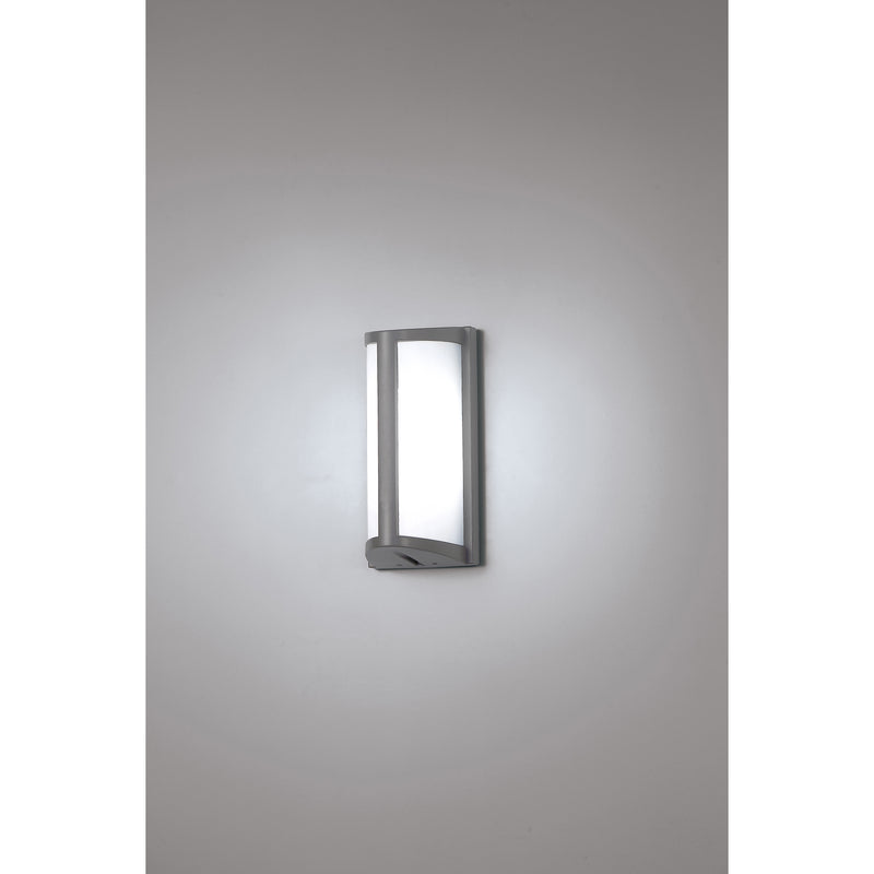 Modern outdoor wall light fixture on a gray background