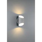 Modern outdoor wall light fixture on a gray background