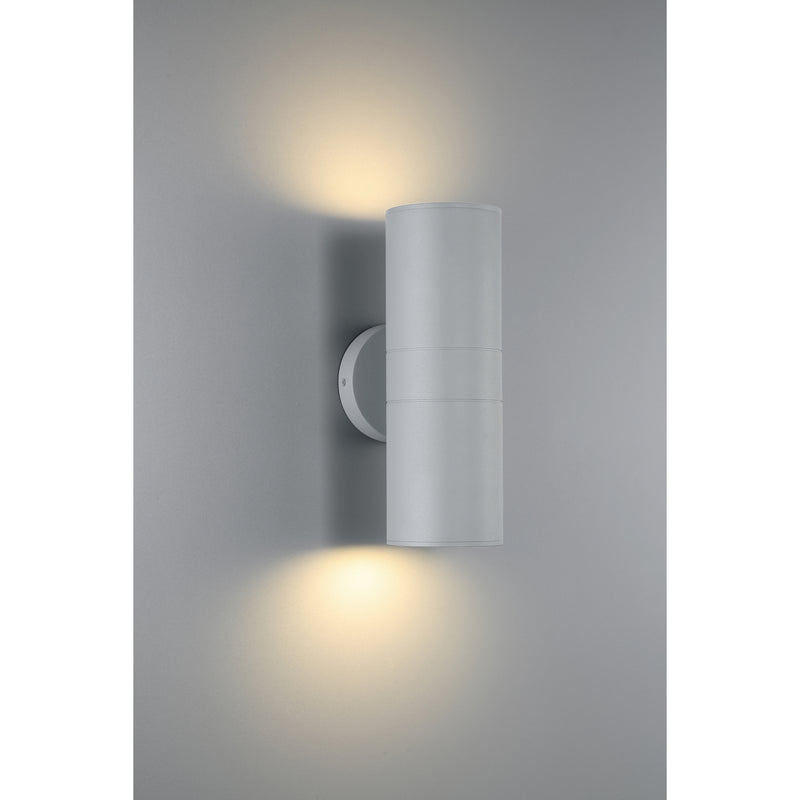 Modern outdoor wall light fixture on a gray background