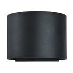 Black cylindrical wall light fixture on a white background