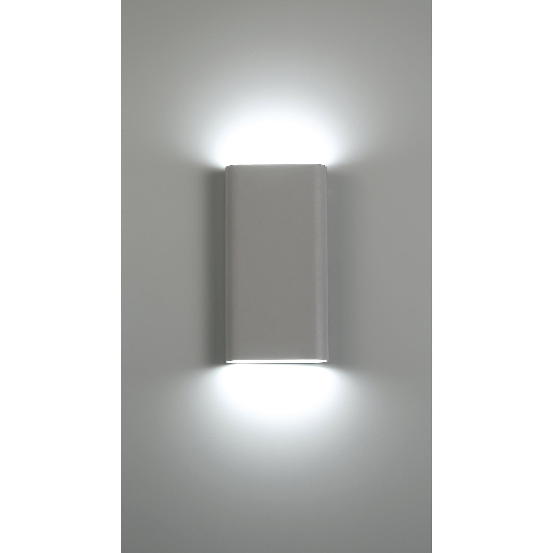 Modern wall-mounted light fixture on a gray wall