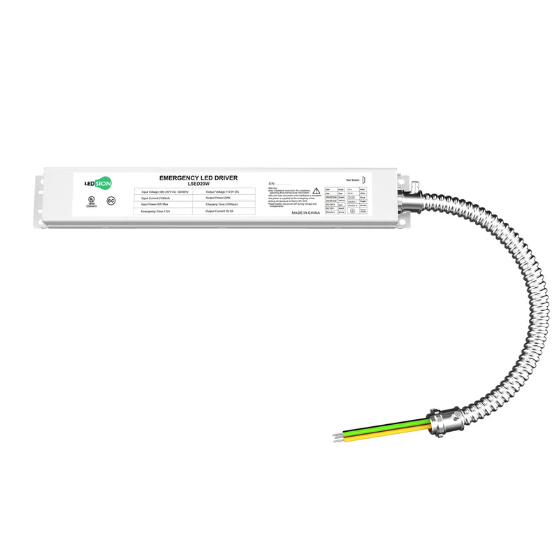 White rectangular led emergency driver with coiled metallic conduit and exposed wires on back side of 2x2 led backlit panel