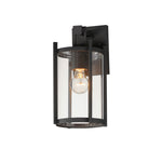 Black outdoor wall light fixture with clear glass cover on a white background