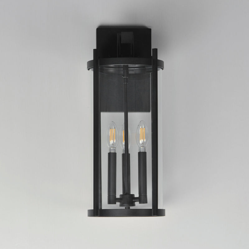 Black outdoor wall light fixture on a gray background