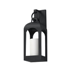 A black outdoor wall lantern light fixture with a white candle-style bulb inside, shown against a plain white background.