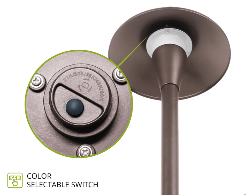 Bronze outdoor pathway lighting with a color selectable switch in a white background