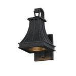 A black metal outdoor wall sconce with a textured finish and a warm gold-toned light bowl, shown against a plain white background.