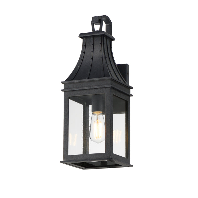Black outdoor wall lantern with clear glass on a white background