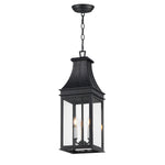 A black lantern-style pendant ceiling light with clear glass panels and three visible candle-style bulbs, suspended by a chain against a plain white background.