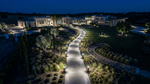 Modern minimalist mansion lit by commercial LED bollard light with cone reflector and selectable CCT in black exterior
