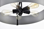 Ceiling light fixture with black metal arms and clear glass shades on a white background