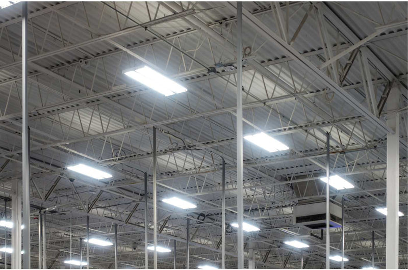 LED Adjustable High bay light installed near the roof of a factory. 