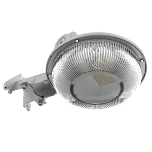 Silver-colored circular led dusk to dawn security light with ribbed glass cover and mounting bracket for outdoor use