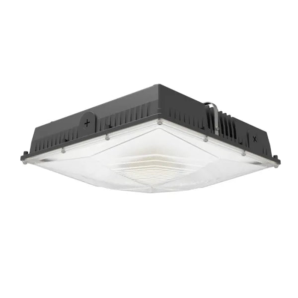Black led slim canopy light with clear diffused lens and heat-dissipating ridged housing for industrial use