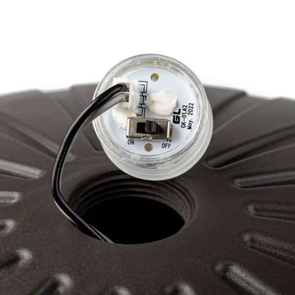 Clear plastic led bollard light with black wire and switch labeled gk-01a2 bronze 3000 lumen max 120-277v