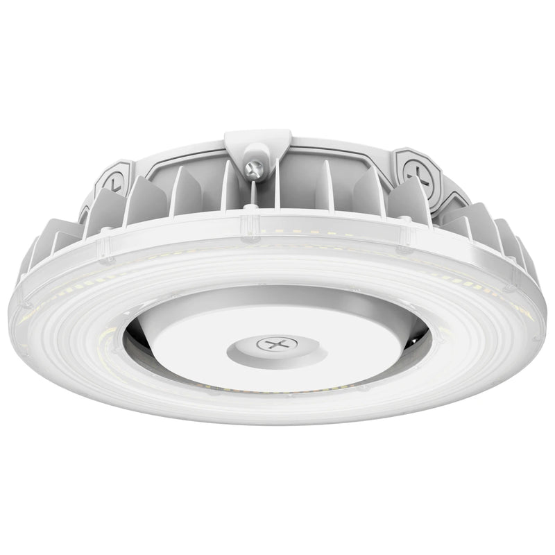 A white circular LED ceiling light fixture with a ribbed outer casing and a central mounting bracket, shown against a plain white background.