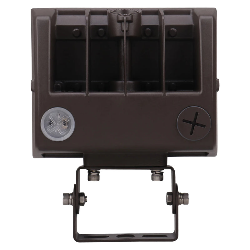 A dark brown rectangular outdoor light fixture with a mounting bracket, featuring a circular lens on the left and a screw terminal on the right, isolated on a white background.