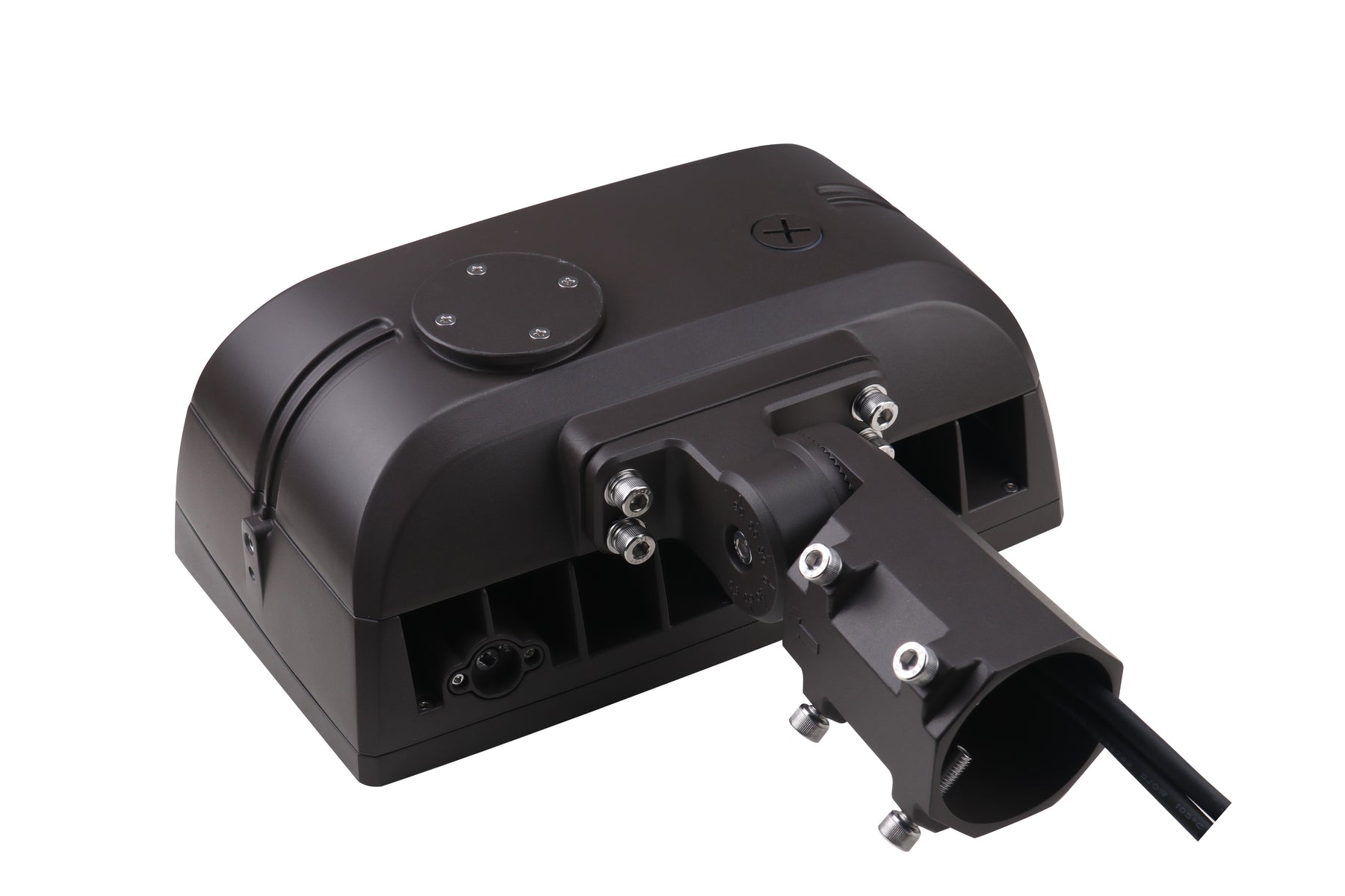 Black plastic mounting bracket with metallic screws and circular panel on top of led flood light with integrated photocell