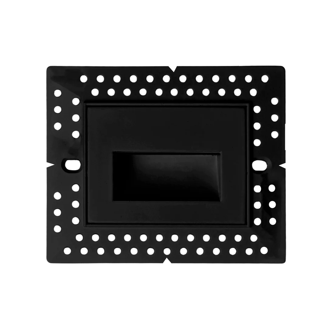 A black metal mounting bracket with a perforated outer frame and a central recessed panel, shown against a plain white background.