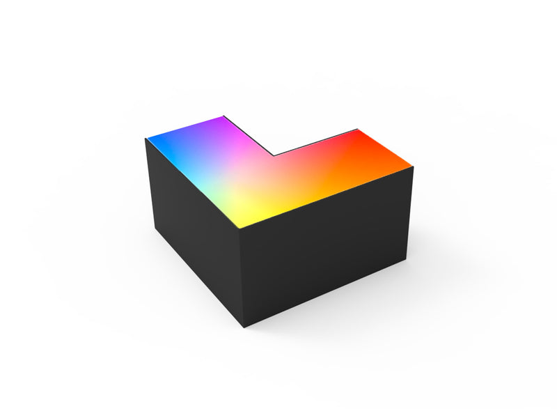 Black l-shaped rgbw beam connector with vibrant rainbow-colored illuminated top surface in a sleek architectural design