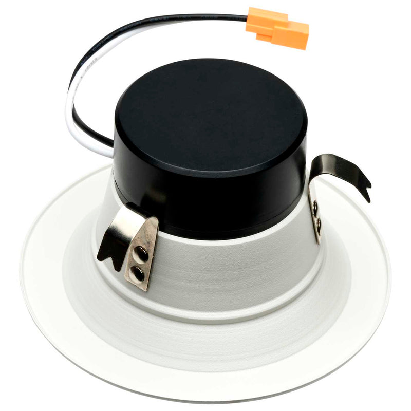 Downlight fixture with black lens and white trim on a white background