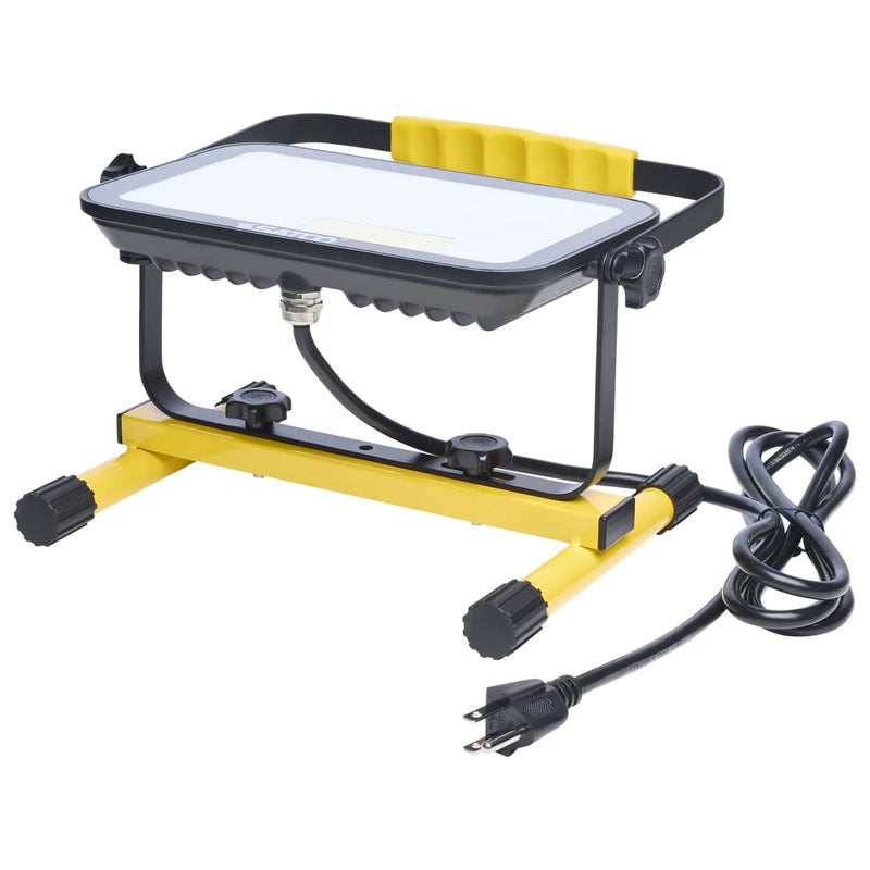 A portable work light with a yellow and black metal stand, featuring a white diffuser panel on top, a yellow handle, and an attached black power cord with a US plug, shown on a white background.