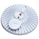 A white circular electronic device with a ribbed outer edge, a central screw terminal, and a small red component, shown on a plain white background.