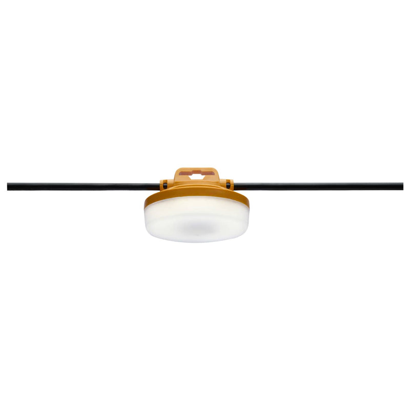 Ceiling light fixture with white shade and gold fixture on a white background