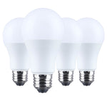 Four white light bulbs with silver bases on a white background