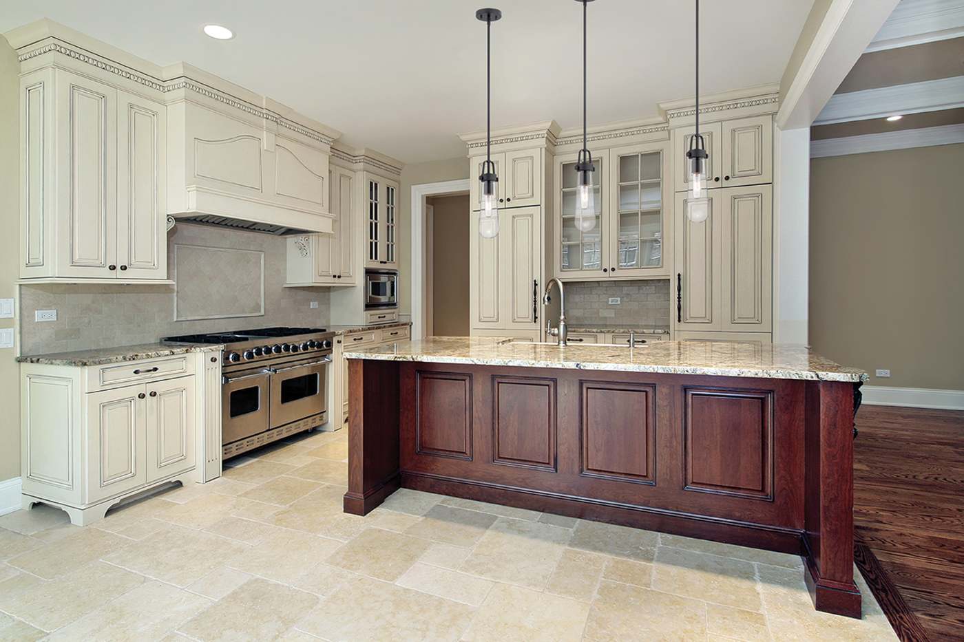 Modern kitchen with wooden island and stainless steel appliances