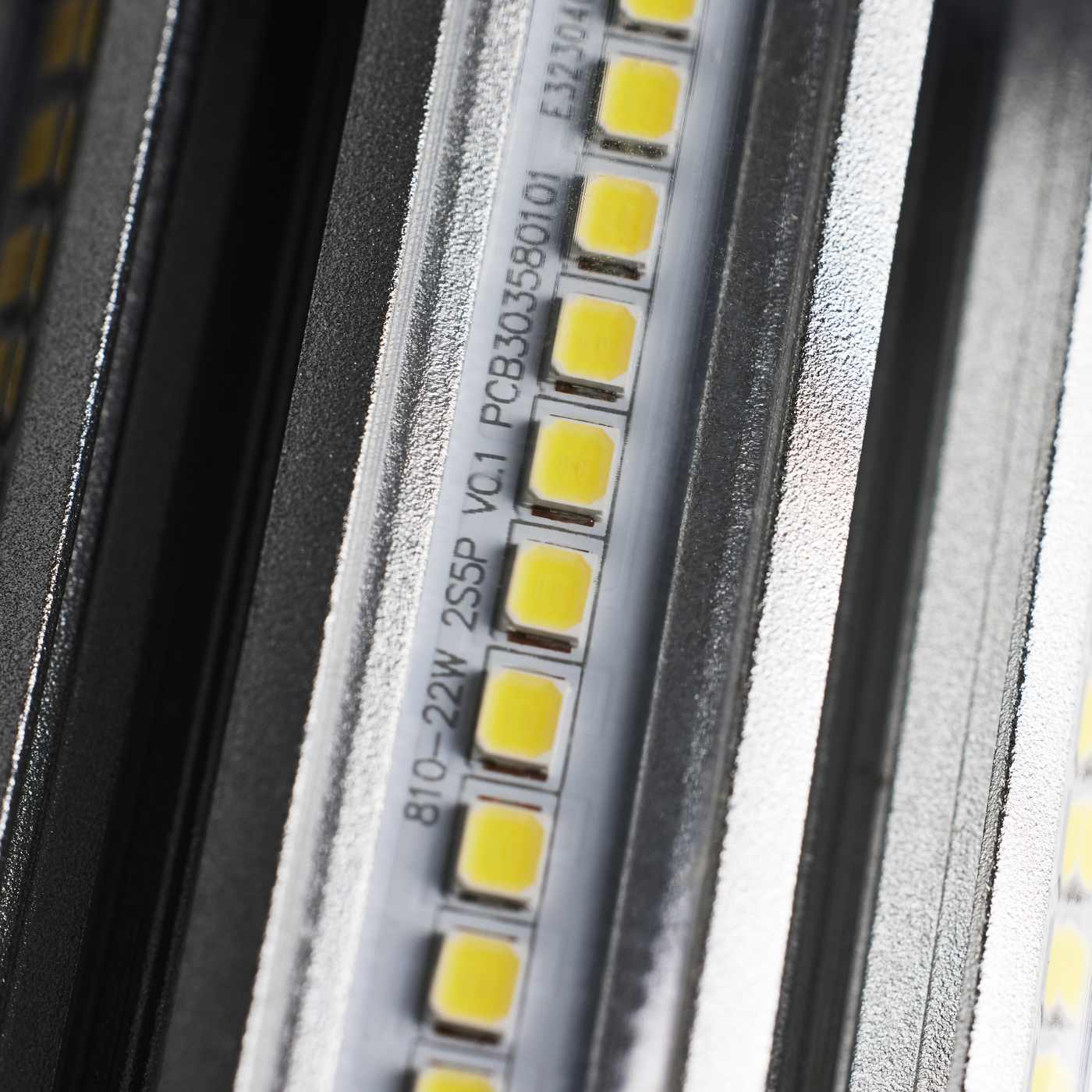 Close-up of a LED strip with visible circuitry and labels.
